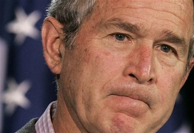 President Bush listens to a question regarding Attorney General Alberto Gonzales during a joint news conference with Brazil's President Luiz Inacio Lula da Silva, not pictured, at Camp David, Md., Saturday, March 31, 2007. (AP 
