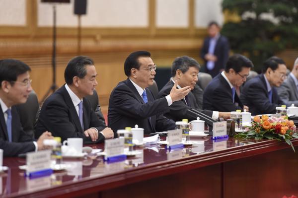 Chinese premier holds talks with German chancellor