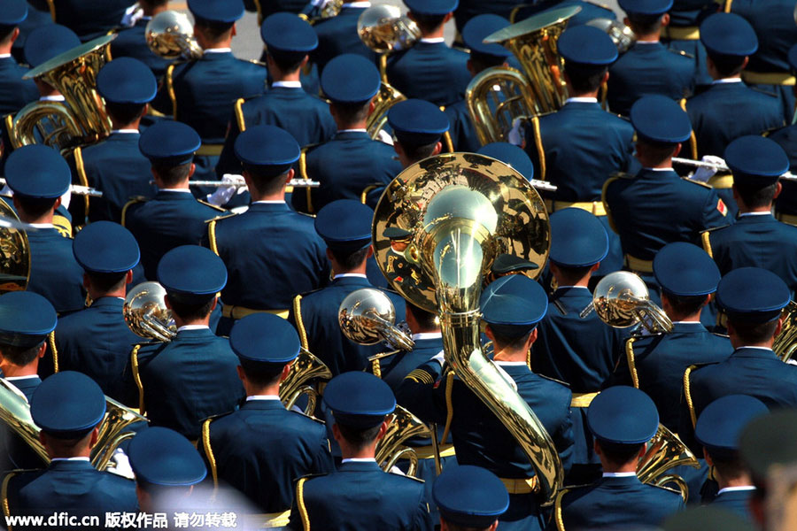 Military band performance, gun salute and flag raising