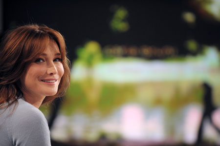 France's first lady Carla Bruni poses before an interview on the set of French TV channel TF1 in Paris July 11, 2008.