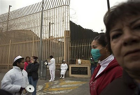 Swine flu spreads to Middle East, Asia-Pacific