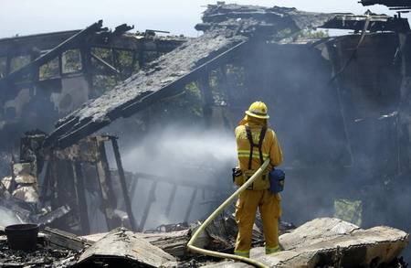 Calif. wildfire imperils Santa Barbara; homes lost