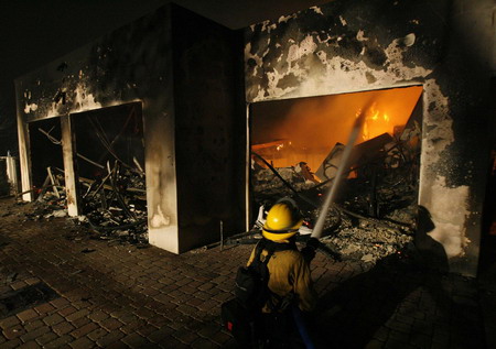 Calif. wildfire imperils Santa Barbara; homes lost