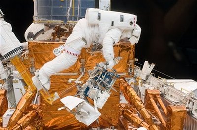 Spacewalkers pull off toughest Hubble repairs yet