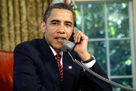 Obama calls astronauts aboard shuttle Atlantis