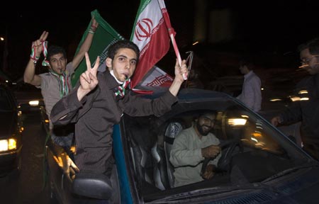 Iran's Ahmadinejad, rival both claim election win