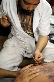 Tattoos leave Belgian teenager star-faced