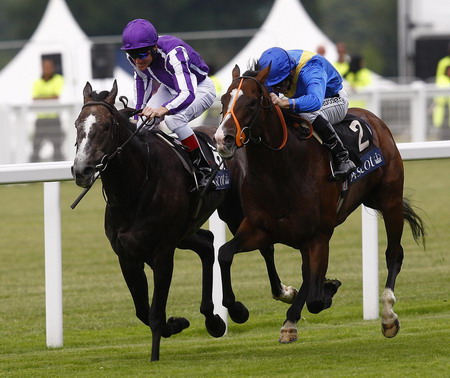 UK Royal Ascot: He on horse, she in hat