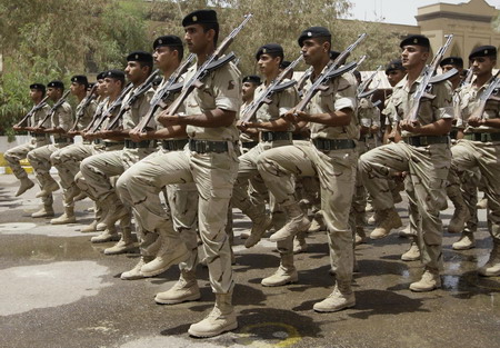 Fireworks over Baghdad as Iraqis take over cities