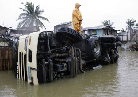 Tropical storm 'Seven' floods Manila streets