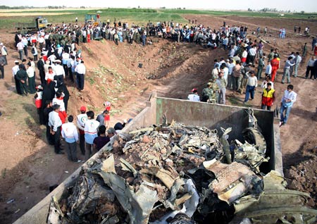 Relatives mourn Iran plane crash victims