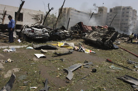 Waves of Baghdad blasts kill 97