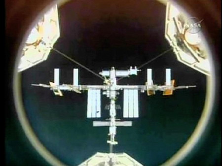 Shuttle Discovery reaches space station