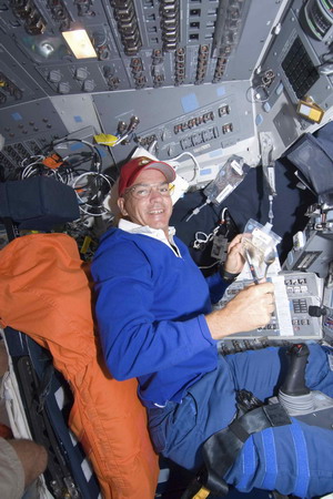 Shuttle Discovery reaches space station