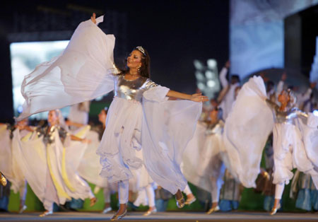 Hugs from Chavez as Gaddafi's Libya reaches 40