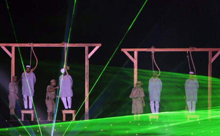 Hugs from Chavez as Gaddafi's Libya reaches 40