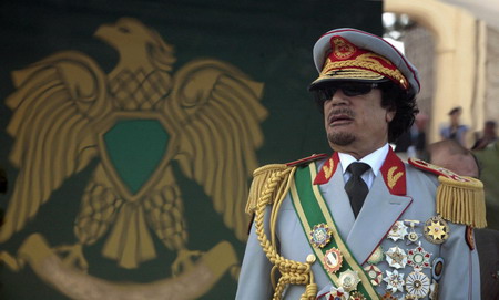Hugs from Chavez as Gaddafi's Libya reaches 40