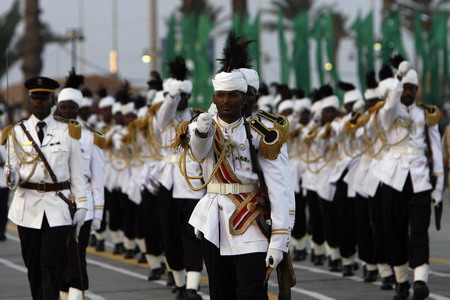 Hugs from Chavez as Gaddafi's Libya reaches 40