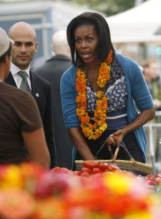 Michelle Obama attends market opening