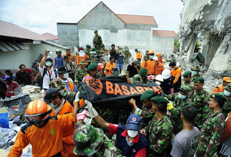 Food aid looted in post-quake Indonesia: TV