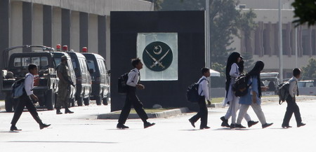 Pakistan commandos free 30 at army HQ, ending siege