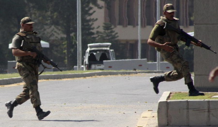 Bloody siege at Pakistan army HQ ends with 19 dead