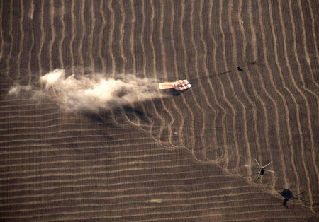 Russian spacecraft with circus tycoon lands safely