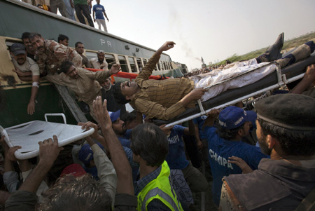 At least 12 killed in Pakistan train collision