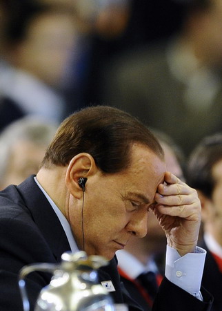Fed up with Berlusconi, Italians rally in Rome