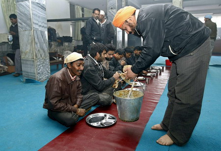Stranded Indian workers seek shelter in Afghan temple