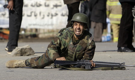 Afghans tighten security in Kabul after attack