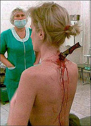 Woman stabbed didn't notice blade in neck