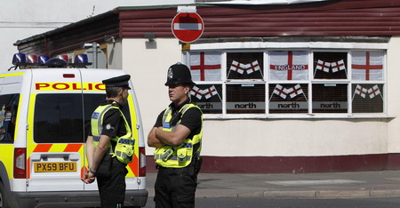 UK taxi driver kills 12 in shooting rampage