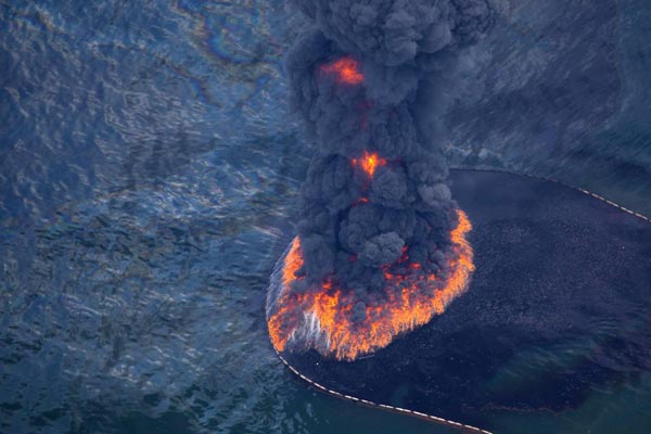 As oil spews in Gulf, BP chief at UK yacht race