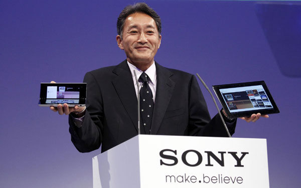 Kazuo Hirai, President and Group CEO of Sony Computer Entertainment, presents the new Sony S tablet (R) and the P tablet during a news conference at the IFA consumer electronics fair in Berlin August 31, 2011 Sony tablets face tough sell on price, hardware