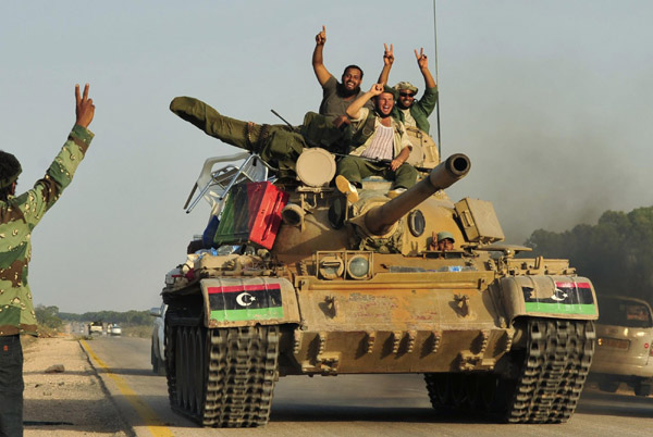 Pro-Gaddafi mercenaries carry out reprisals Pro-Gaddafi mercenaries carry out reprisals