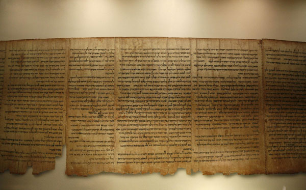 A facsimile of the Isaiah Scroll, one of the Dead Sea Scrolls, is displayed inside the Shrine of the Book at the Israel Museum in Jerusalem Sept 26, 2011. 2000-Year-Old Dead Sea Scrolls Go Online