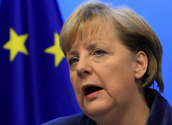 Germany's Chancellor Angela Merkel holds a news conference at the end of a euro zone summit in Brussels, October 27, 2011. Europe crafts debt deal that pleases markets