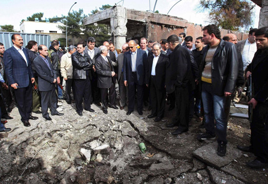 Double car bombing kills 44 in Damascus Suicide bombings kill 44 in Syria