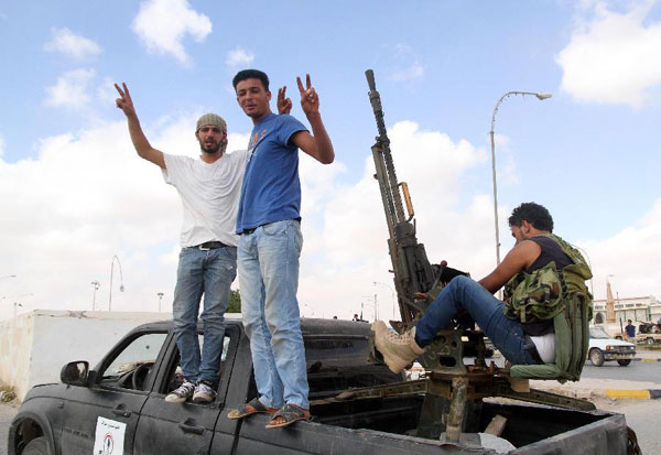 Libyan pro-govt forces seize old Gadhafi bastion