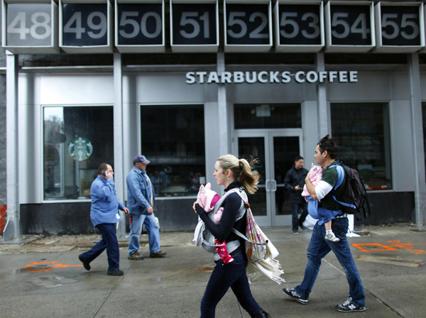 US companies hustle to reopen after Sandy