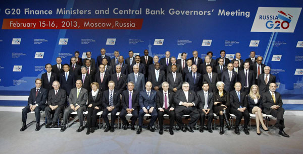 Finance ministers and central bank governors pose for a family photo during a meeting of G20 finance ministers and central bank governors at the Manezh Exhibition Center in Moscow, Feb 16, 2013. G20 vows to support financial stability, sustainable growth