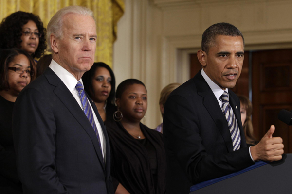 US President Barack Obama (R) delivers remarks next to Vice-President Joe Biden on common-sense measures to protect children from gun violence at the White House in Washington, March 28, 2013. Obama makes plea for gun control legislation