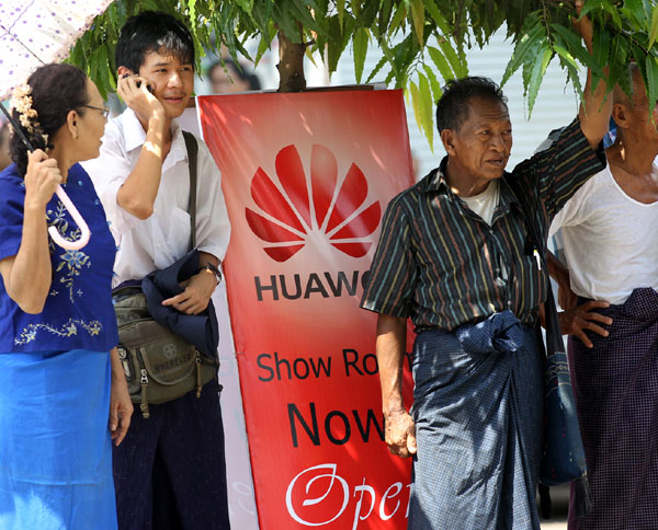 Huawei Technology opens its first flagship showroom in Myanmar on May 5, 2013. Myanmar reforms won't hurt China links