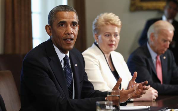 US President Barack Obama pauses while speaking about Syria to reporters during a meeting with Baltic leaders in the Cabinet Room of the White House in Washington August 30, 2013. Obama vows 'limited, narrow' strikes on Syria