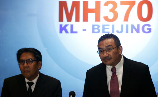 Malaysian officials hold news conference on missing plane
