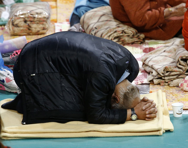 First bodies found within cabins of S. Korean sunken ferry