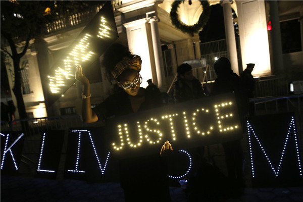 Thousands rally across US after Ferguson decision