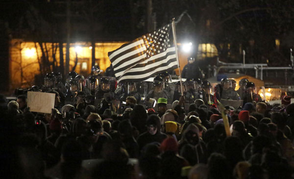 Missouri police officer not charged in black teen's shooting