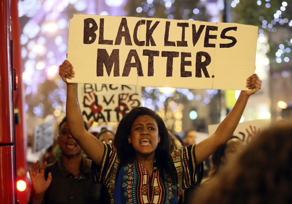 More than 400 arrested as Ferguson protests spread